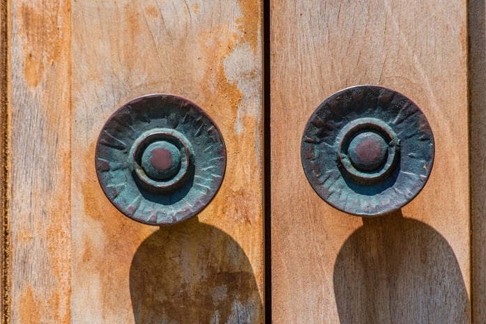 Colourful door knobs patina